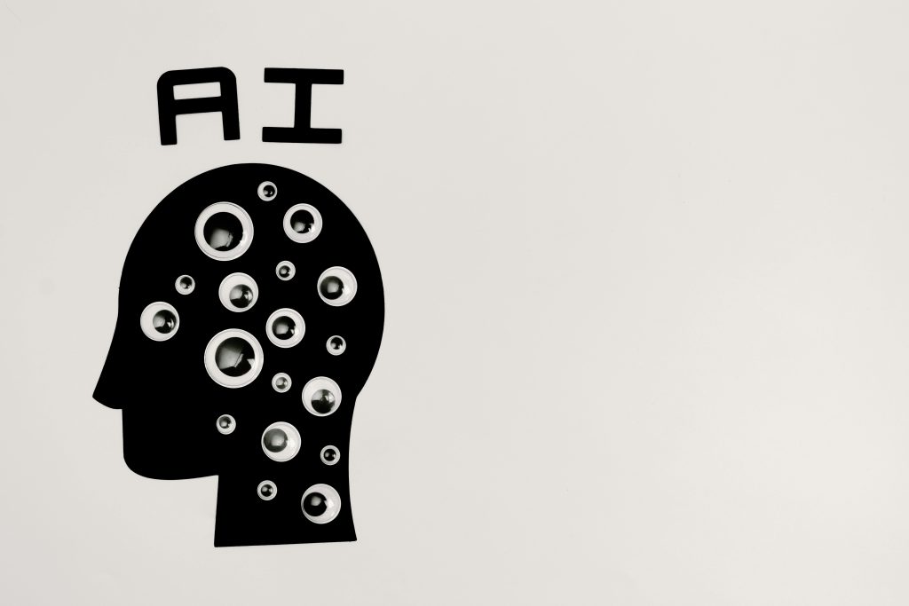 pexels-photo-8849295-8849295 Abstract illustration of AI with silhouette head full of eyes, symbolizing observation and technology.